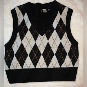 black sweater vest